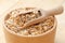 Wooden bowl and scoop filled of sprouted wheat seeds and sack of