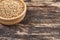 Wooden bowl and wheat grain