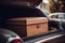 wooden box in the open trunk of the car. Transportation of things or travel