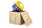 Wooden box, parcel with Bosnian and Herzegovinan flag. Shipping and delivery in Bosnia and Herzegovina, concept. 3D rendering