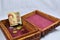 Wooden box with red carpet, coins and Iran Rial banknote