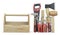 Wooden box for your toolbox. Next to which is an ax, a chisel, a chisel, pliers, a mallet, a hammer, a screwdriver, a wrench, a