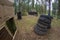 Wooden boxes and tyres on paintball field