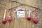 Wooden branches with christmas ornaments and candy