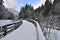 Wooden bridge approach covered with snow