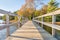 Wooden bridge in autumnal park