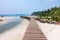 Wooden bridge, corridor to the sea on Beautiful crystal clear se