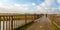 Wooden bridge and a female rider on horseback