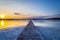 The wooden bridge long to the sea with twilight sky background at KohKham island