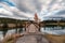 Wooden bridge with mount Rundle in autumn public park at Cascade Ponds, Banff national park