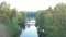 Wooden bridge over the lake in Pushcha Voditsa park.