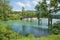 Wooden bridge over Mangfall river, beautiful bavarian landscape in june, tourist resort Gmund