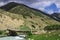 Wooden bridge over mountain river