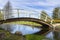 Wooden bridge over the river, Riverside Park Jokipuisto, Kotka, Finland