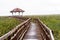 Wooden bridge and pavilion lake on drop raining in Sam Roi Yot