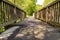 Wooden bridge for pedestrians and cyclists on the Elbuferstrasse in Lower Saxony, Germany, in the sunshine