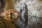 Wooden bridge reflexion in underground salt mine