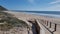 Wooden bridge to the beach on a bright sunny day in Figueira da Foz