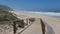 Wooden bridge to the beach on a bright sunny day in Figueira da Foz