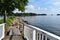 Wooden bridge towards a rocky shore