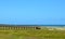 Wooden bridge walk to the ocean beach