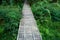 Wooden bridge walkway Bamboo bridge spanning to the garden