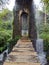 wooden bridges cross the ancient buildings and the water flows swiftly.