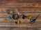 Wooden brown table with alcohol bottles and glasses and marijuana ashtray