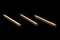 Wooden brown toothpick isolated on black glass