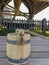 a wooden bucket stands on a wooden deck