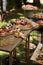 Wooden buffet table with snacks, appetizer and fruits