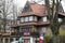 Wooden building with stone decorated ground floor