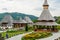 Wooden buildings in the courtyard of Barsana Monastery, Maramures, Romania