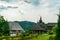 Wooden buildings in the courtyard of Barsana Monastery, Maramures, Romania