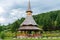 Wooden buildings in the courtyard of Barsana Monastery, Maramures, Romania