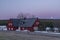 Wooden buildings in Jizerka small village before cold fresh color sunrise