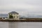 Wooden buildings in the port city of Seydisfjordur located by the fjord, Iceland