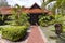 Wooden bungalow among a beautiful garden in Pelangi Beach Resort