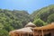 Wooden bungalow on white sand beach in tropical paradise. Wooden cottage with a reed roof on the island of Gili Meno in Indonesia