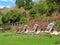 Wooden bungalows on green lawn