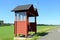 Wooden Bus Stop Shelter by Highway