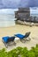 Wooden cabin and beach chairs