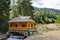 Wooden cabin built over a waterfall