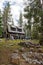 Wooden cabin in forest