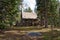 Wooden cabin in forest