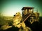 Wooden cabin on main peak of rock as view point, dark clouds in the sky. Summer morning in sandstone rocks