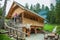 Wooden cabin with tourists at Hija Glamping Lake Bloke in Nova Vas, Slovenia