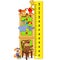 Wooden cabinet with toys measure the child growth