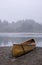 A wooden canoe on a beach