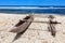 Wooden canoe on a pebbly shore in Tanna, Vanuatu